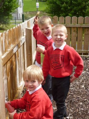 Reception and P1 enjoying outdoor play.